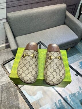 Women's Gucci Beige Monogram Clogs Buckles